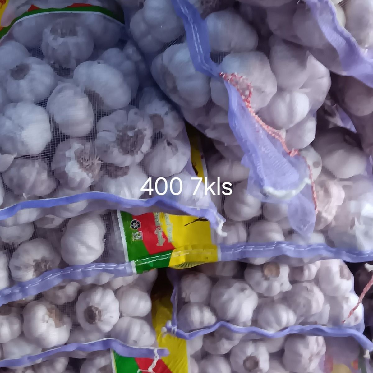 Garlic bulbs in purple net bags from Zobre Consumer Goods Trading in Cagayan de Oro